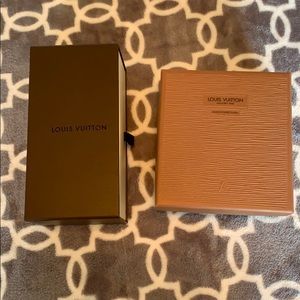 Two empty Authentic Louis Vuitton boxes